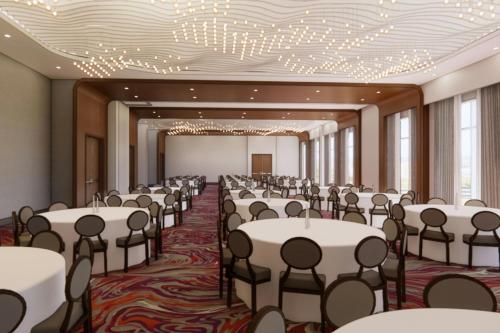 a banquet hall with white tables and chairs at Renaissance Atlanta Midtown Hotel in Atlanta