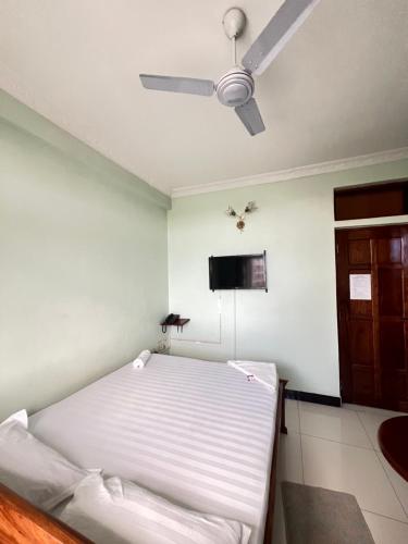 Postel nebo postele na pokoji v ubytování San Diego Hotel & Bar