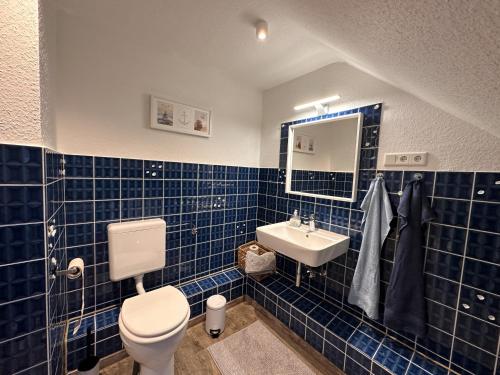 Ένα μπάνιο στο Ferienwohnung Deichblick