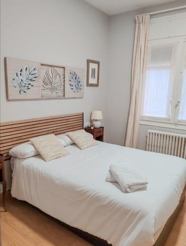 Postel nebo postele na pokoji v ubytování Piso en Escarrilla - 3 Habitaciones