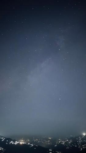 a night time view of the sky with stars at Art Mile Kalimpong in Kalimpong