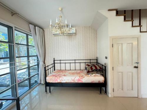 Ein Bett oder Betten in einem Zimmer der Unterkunft PY house khaoyai