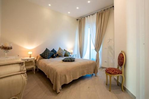Postel nebo postele na pokoji v ubytování Al Chiaro di Luna Resort