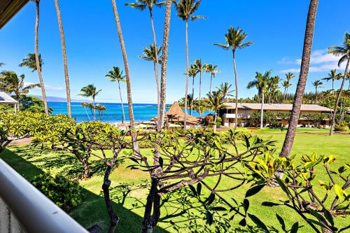 a view of the ocean from the balcony of a resort at Napili Shores H263 in Kapalua