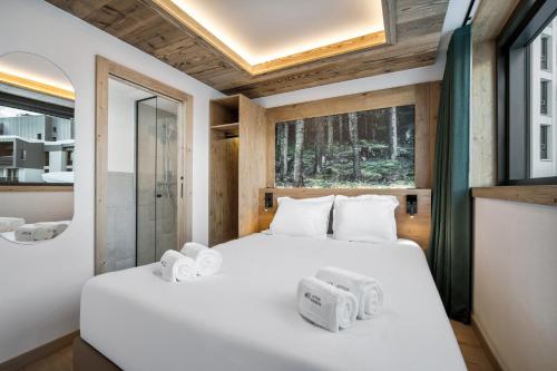 Chalet Hôtel Quartzにあるベッド