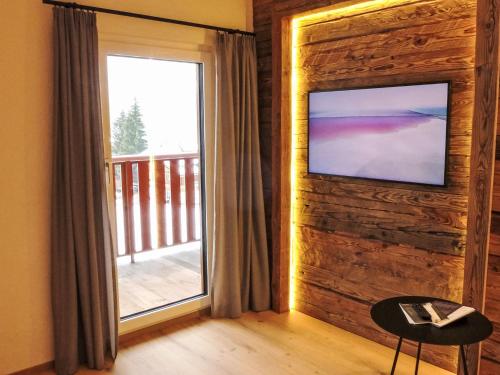 Μια τηλεόραση ή/και κέντρο ψυχαγωγίας στο Apartment Wiedersehn Dachgeschoss by Interhome