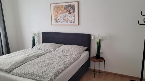 Postel nebo postele na pokoji v ubytování Franzis Appartments Sissi