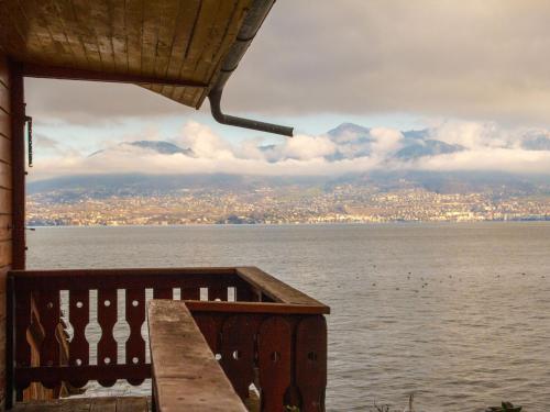a view of the water from a balcony of a building at Chalet Le Cabanon by Interhome in Saint-Gingolph