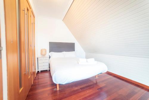 Apartamento Pérez Villaamilにあるベッド