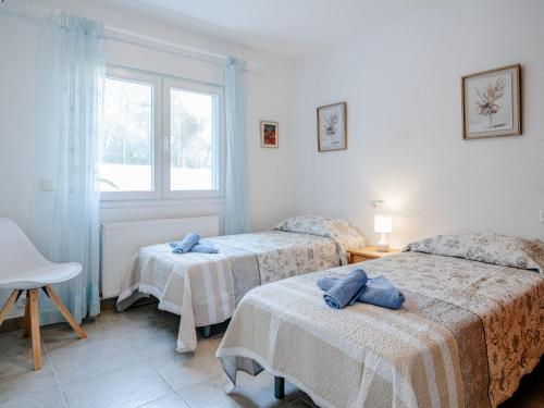 Ένα ή περισσότερα κρεβάτια σε δωμάτιο στο Holiday Home Gavrena by Interhome