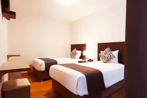 Letto o letti in una camera di Hotel La Casa de Irma