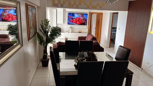 TV a/nebo společenská místnost v ubytování Apartamento en torres del Farallón, SDE, RD