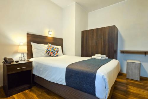 Letto o letti in una camera di Hotel La Casa de Irma