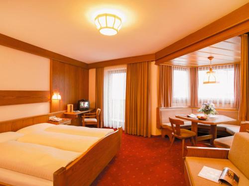 Posteľ alebo postele v izbe v ubytovaní Hotel Lammwirt