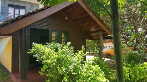 a patio of a house with a porch at Dreamvillage in Dodanduwa