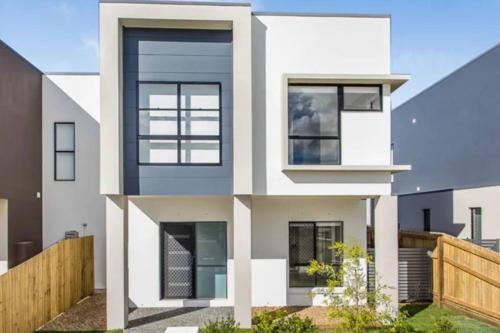a rendering of a white house at Modern Elegance Near Lakes Train Parks and Beaches in North Lakes
