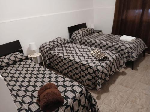 Кровать или кровати в номере San Giacomo Rooms