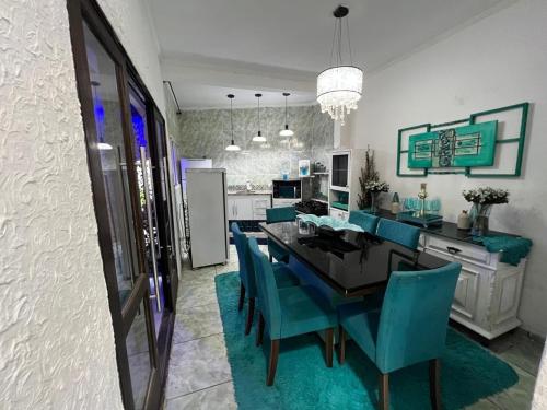 Coin salon dans l'établissement Mansão pé na areia