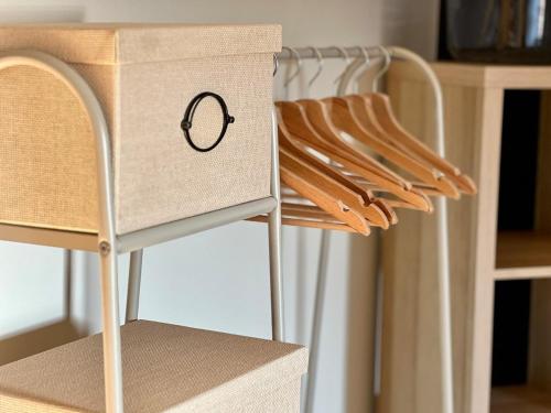 a cardboard box sitting on top of a chair at Isa'Bellescale - Fully equipped house 2km from Brussels South Airport in Ransart