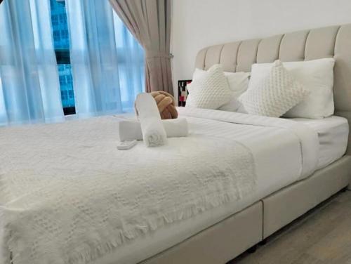 Agile SkyView Suites KLにあるベッド