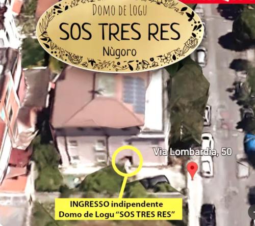 a sign that reads sos treesres nogongo with a car in front at Domo de Logu SOS TRES RES in Nuoro