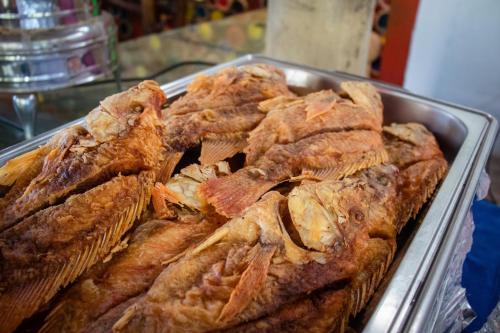 a tray of pastries sitting on a table at Hotel Isla Real in Tierra Bomba