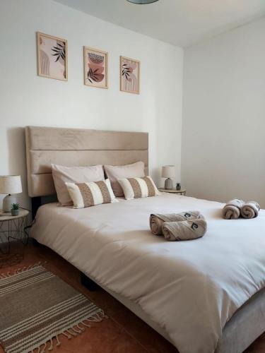 Ένα ή περισσότερα κρεβάτια σε δωμάτιο στο Areal Guest House