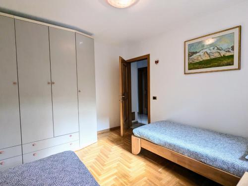 Een bed of bedden in een kamer bij Casa Lagoraiview