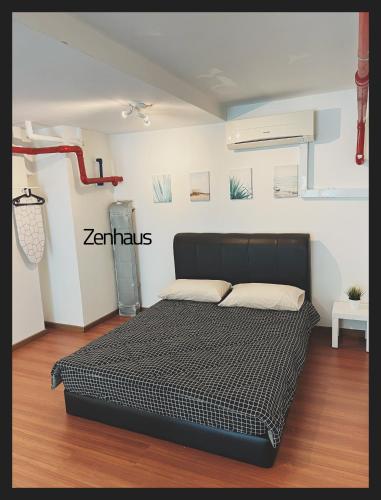 a bedroom with a bed in a room at THE CEO LOFT by Zenhaus in Bayan Lepas