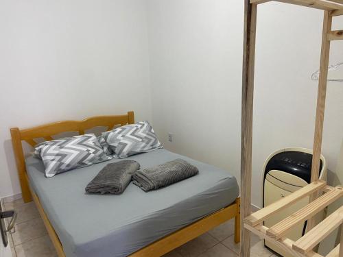 Ένα ή περισσότερα κρεβάτια σε δωμάτιο στο Pousada Vila do Meio