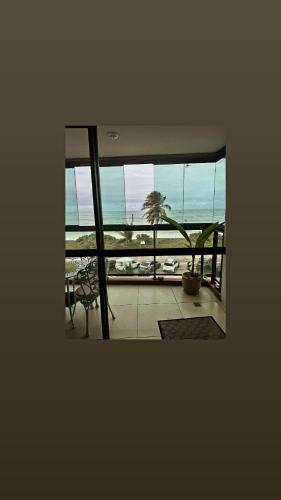 a view of a balcony with a view of the ocean at Luxor Paulo Miranda Frente ao mar in João Pessoa