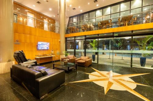a lobby with a star on the floor of a building at Royal Golden Hotel - Savassi in Belo Horizonte
