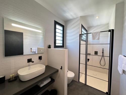 Vannituba majutusasutuses Appart hôtel PALM Suites CAYENNE