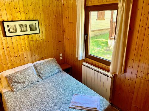 Postel nebo postele na pokoji v ubytování Camping Valle de Hecho