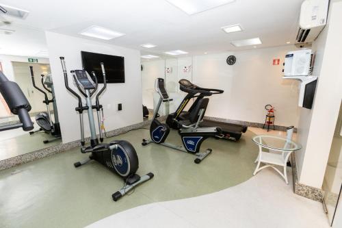 a gym with several exercise bikes in a room at Royal Golden Hotel - Savassi in Belo Horizonte
