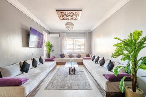 Ein Bett oder Betten in einem Zimmer der Unterkunft Oceanview Apartment with Stunning City View