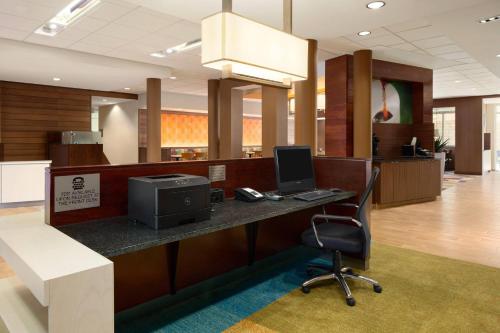 an office with a desk with a computer and a chair at Fairfield Inn & Suites by Marriott Bristol in Bristol