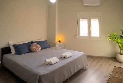 Posteľ alebo postele v izbe v ubytovaní Ierapetra flats 2