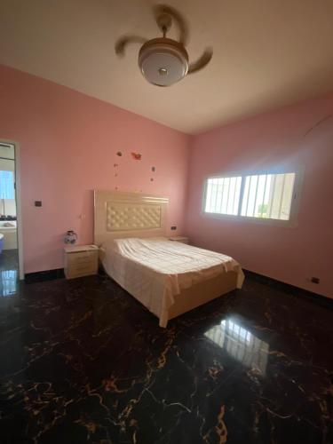 Ein Bett oder Betten in einem Zimmer der Unterkunft Aigrettes