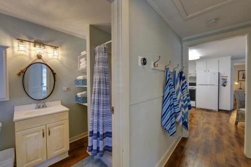 a bathroom with a sink and a mirror at Tipsy Turtle - 1227 Beachview Drive in East End