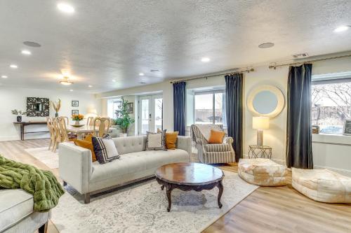 a living room with a couch and a table at Private Pool and Hot Tub Luxe Unit Near UTA Train! in American Fork