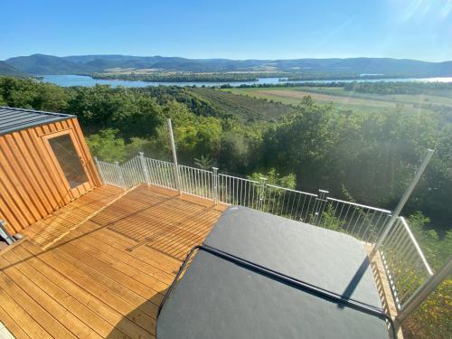 a large wooden deck with a skateboard on it at Fülemüle Vendégház in Zebegény