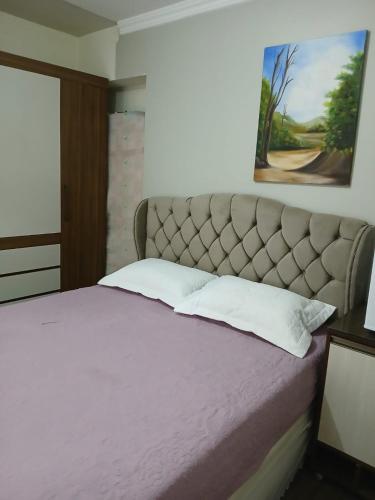 Ένα ή περισσότερα κρεβάτια σε δωμάτιο στο Suíte Aconchegante Balneário Camboriú próximo Praia