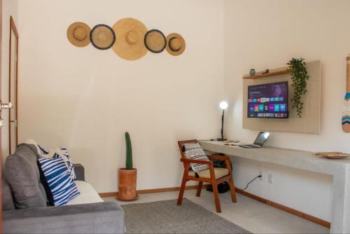 TV a/nebo společenská místnost v ubytování Nomad Palmeira Casa com charme local com piscina privativa