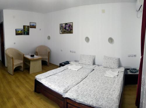 Ένα ή περισσότερα κρεβάτια σε δωμάτιο στο Apartmani "Vila Jelena" Arandjelovac
