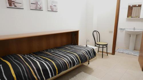 Postel nebo postele na pokoji v ubytování Alloggio Maria Gubbio Centro