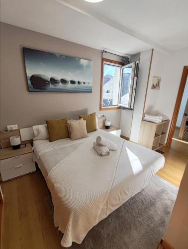 Postel nebo postele na pokoji v ubytování Apartamento en Formigal - Parking Privado Incluido