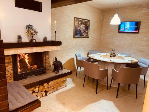 A television and/or entertainment centre at Villa Ema