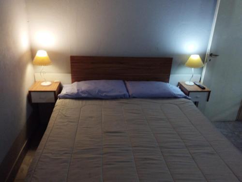 Ένα ή περισσότερα κρεβάτια σε δωμάτιο στο La guido 2