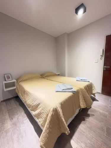 Postel nebo postele na pokoji v ubytování DEPARTAMENTO en MICROCENTRO